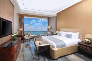 TV o dispositivi per l'intrattenimento presso Wyndham Grand Foshan Gaoming