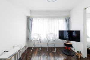 TV a/nebo společenská místnost v ubytování Ruby