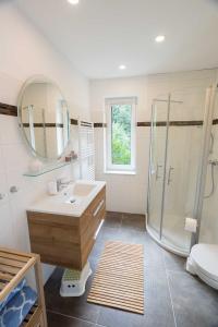 Koupelna v ubytování Ferienhaus Harzblüte + 1 fotografie