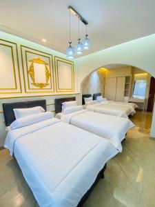 Ένα ή περισσότερα κρεβάτια σε δωμάτιο στο Villa Imperial Silver Puncak
