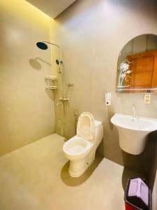 Ένα μπάνιο στο Villa Imperial Silver Puncak