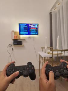 TV a/nebo společenská místnost v ubytování Kwarto Nina