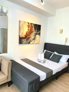 Postel nebo postele na pokoji v ubytování Kwarto Nina + 10 fotografií