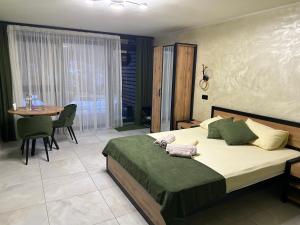 Postel nebo postele na pokoji v ubytování Міні Готель SPA Excellent Family