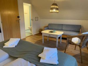 Postelja oz. postelje v sobi nastanitve Lønstrup Strandhotel
