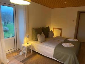 Postelja oz. postelje v sobi nastanitve Lønstrup Strandhotel