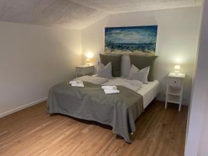 Postelja oz. postelje v sobi nastanitve Lønstrup Strandhotel