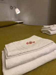 A bed or beds in a room at Domus Prati