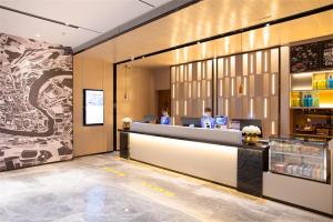 Posezení v ubytování Echarm Hotel Hechi Yizhou Municipal Center Plaza