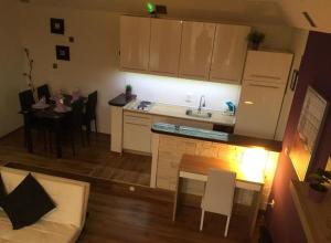 Kuchyň nebo kuchyňský kout v ubytování Apartments San