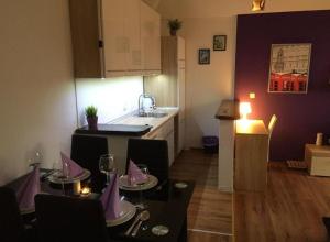 Kuchyň nebo kuchyňský kout v ubytování Apartments San