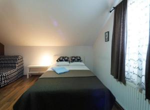 Postel nebo postele na pokoji v ubytování Apartments San