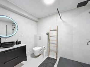 Et badeværelse på Escapade confortable et chic parking et vélo-box