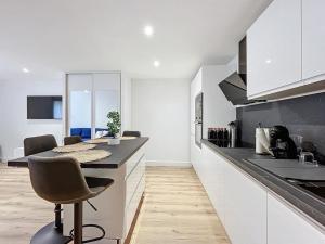 Køkken eller tekøkken på Escapade confortable et chic parking et vélo-box