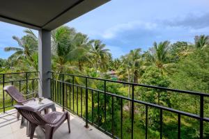 Balkón nebo terasa v ubytování Maikhao Hotel, Phuket