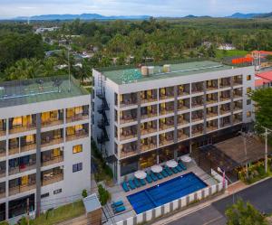 an aerial view of a hotel with a swimming pool at Maikhao Hotel, Phuket in Mai Khao Beach