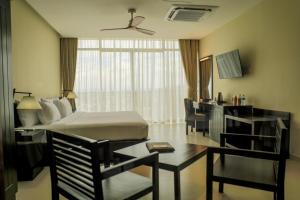 TV i/ili multimedijalni sistem u objektu Oak Ray Heritage Hotel