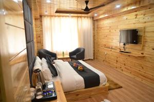 Foto sihtkohas Manāli asuva majutusasutuse !!! Hotel The Nirvana Hills By Hotel Manu !!! A Luxury Stay With Mountain View!!!Couple Friendly!!! Balcony Rooms!!!Open Terrace With 360 View!!! galeriist