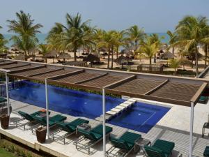 Bazén v ubytování Movenpick Resort Lamantin Saly nebo v jeho okolí