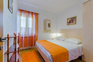 Ένα ή περισσότερα κρεβάτια σε δωμάτιο στο Comfortable Holiday Home with Terrace