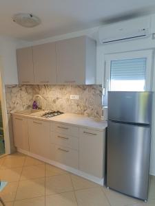 Kuchyň nebo kuchyňský kout v ubytování Apartment Kricin