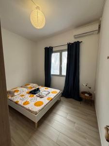 Postel nebo postele na pokoji v ubytování La Villa du Voyageur