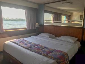 Voodi või voodid majutusasutuse Nile View Aton Cruise toas