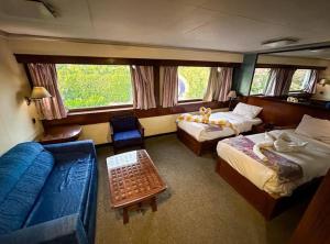 Voodi või voodid majutusasutuse Nile View Aton Cruise toas