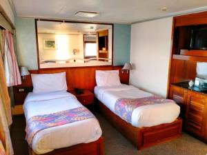 Voodi või voodid majutusasutuse Nile View Aton Cruise toas