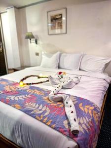 Voodi või voodid majutusasutuse Nile View Aton Cruise toas