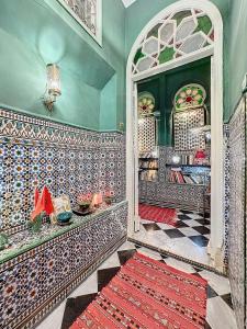 Katil atau katil-katil dalam bilik di Riad ider