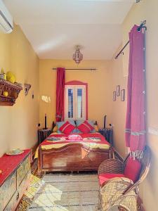 Katil atau katil-katil dalam bilik di Riad ider