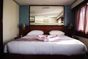 Voodi või voodid majutusasutuse Nile View Aton Cruise toas
