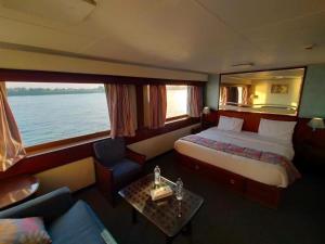 Voodi või voodid majutusasutuse Nile View Aton Cruise toas