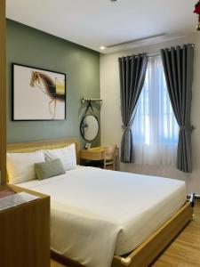 Postel nebo postele na pokoji v ubytování Triland Hotel