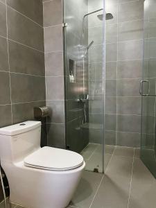 Koupelna v ubytování Triland Hotel