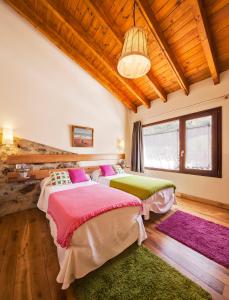 En eller flere senger på et rom på Casas La Xiuca