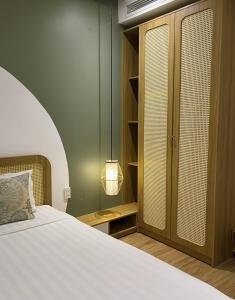 Postel nebo postele na pokoji v ubytování Triland Hotel
