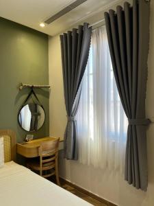 Postel nebo postele na pokoji v ubytování Triland Hotel