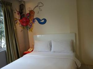 Ένα ή περισσότερα κρεβάτια σε δωμάτιο στο Hotel Strawberry Fields