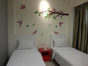 Ένα ή περισσότερα κρεβάτια σε δωμάτιο στο Hotel Strawberry Fields