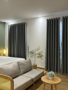 Posezení v ubytování Triland Hotel