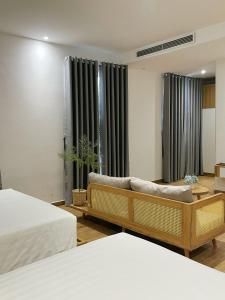 Postel nebo postele na pokoji v ubytování Triland Hotel