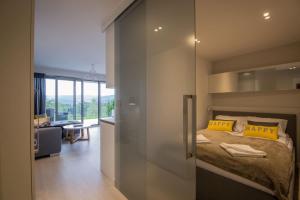 Krevet ili kreveti u jedinici u objektu ApartView Premium by Rent like home