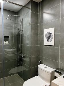 Koupelna v ubytování Triland Hotel