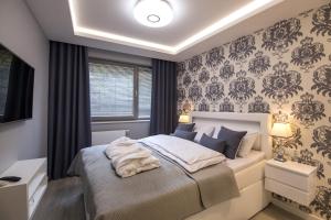 Krevet ili kreveti u jedinici u objektu ApartView Premium by Rent like home