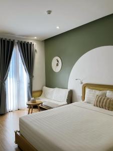 Postel nebo postele na pokoji v ubytování Triland Hotel