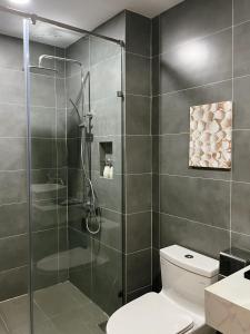 Koupelna v ubytování Triland Hotel