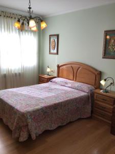 Postel nebo postele na pokoji v ubytování Spacious Apartment in Viveiro with Sea View