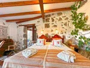 Giường trong phòng chung tại Casa Mirador del Valle